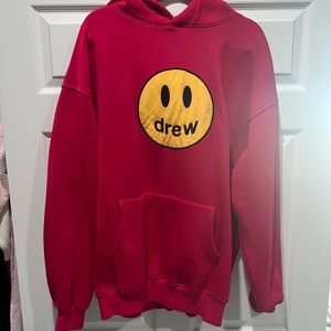 Hot pink DREW house oversized hoodie.